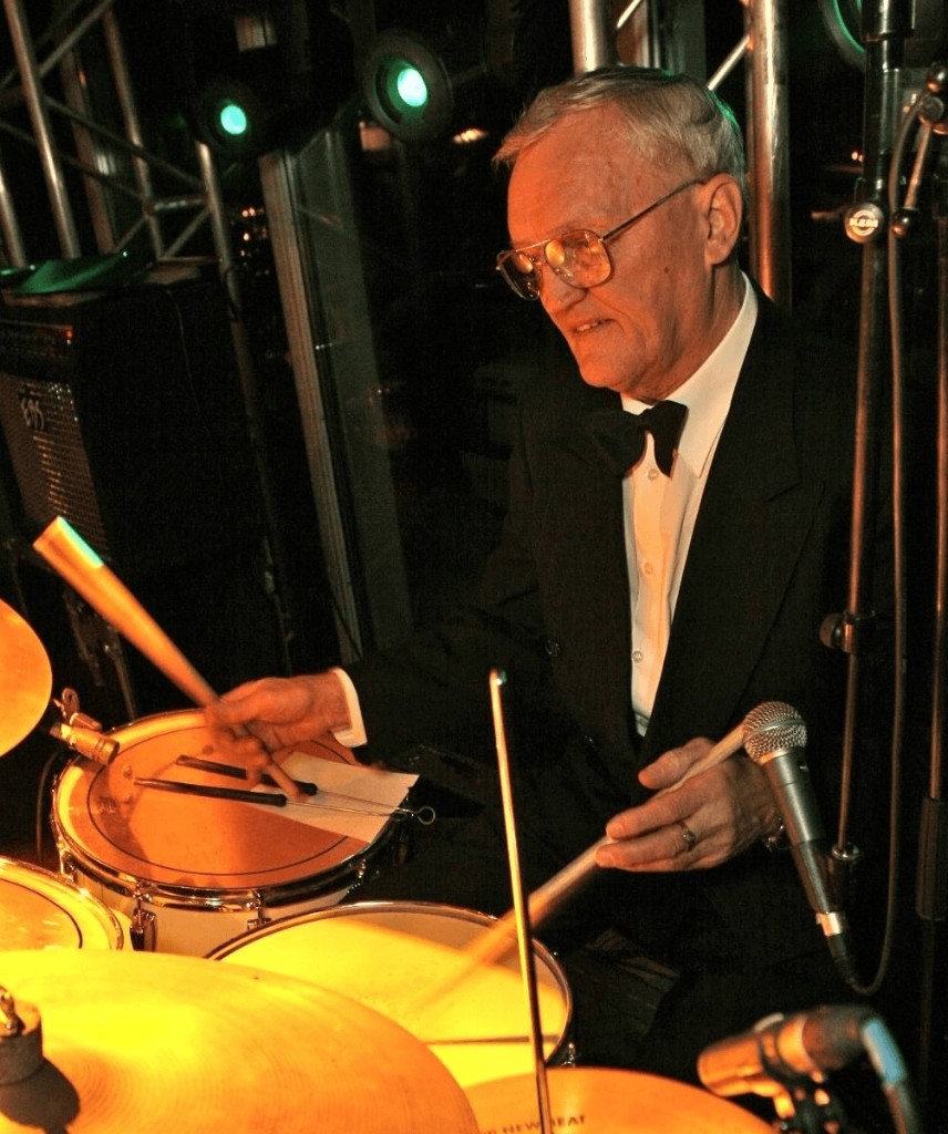 Jazz drummer performing on stage